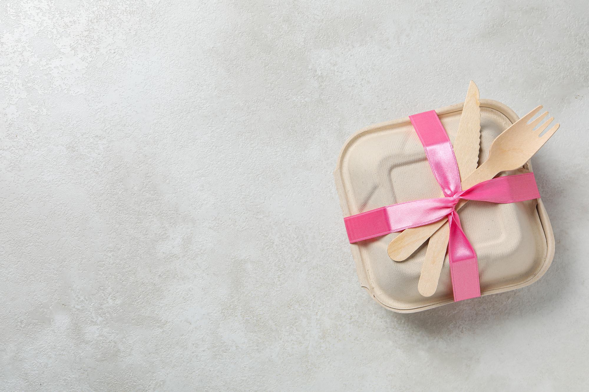 Stacked subscription boxes in soft pastel colors